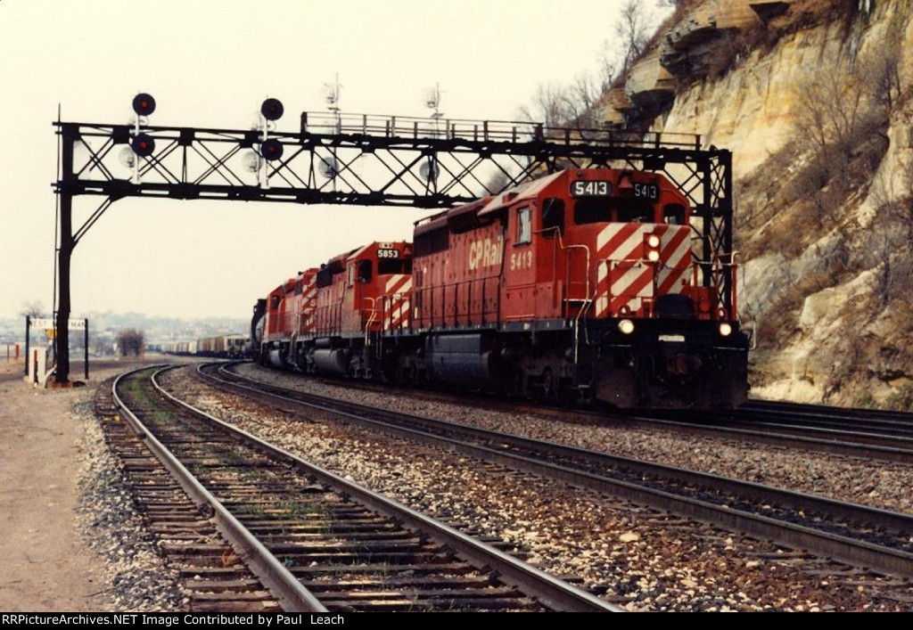 Manifest rolls east behind three SD's
